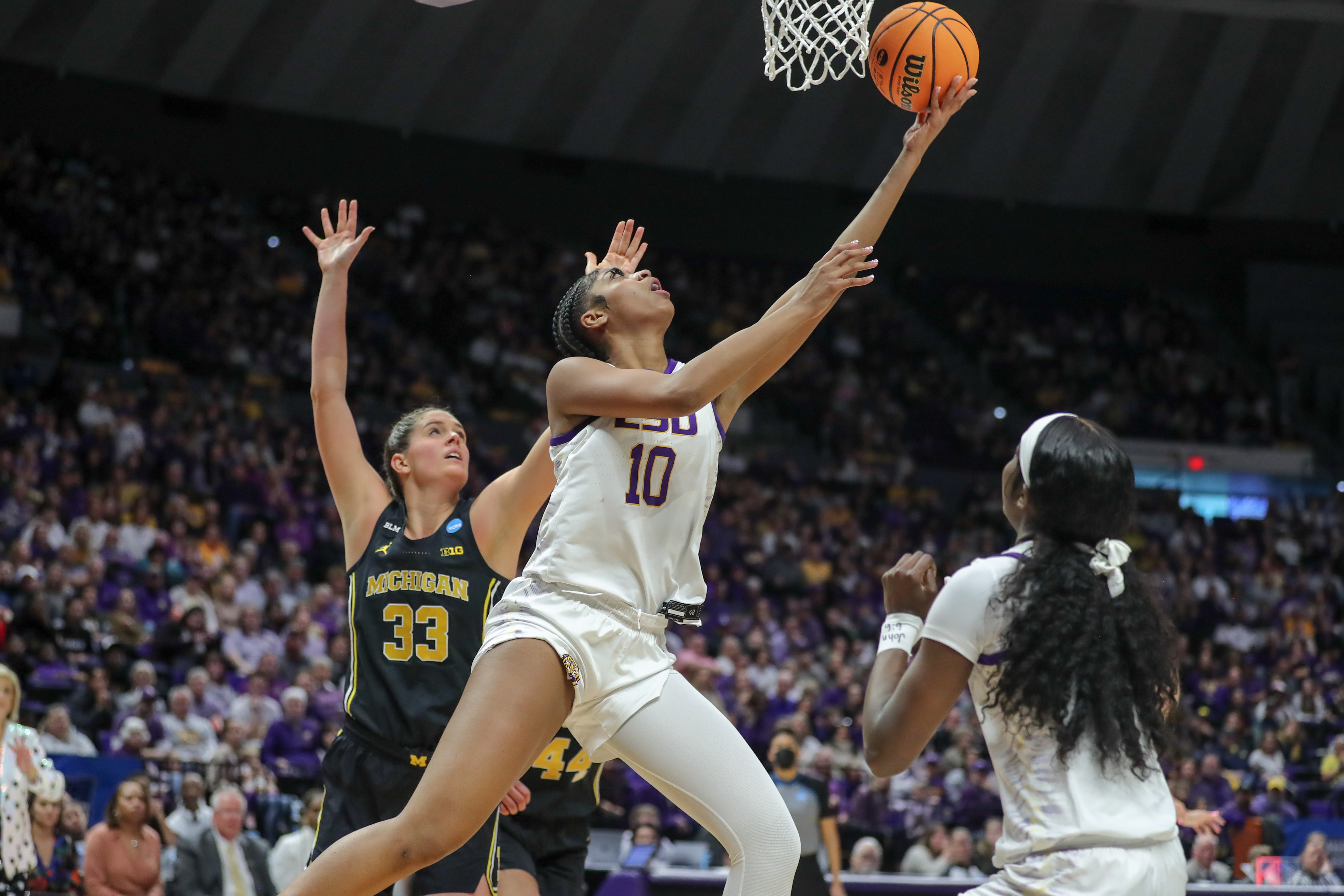 Angel Reese with reverse layup vs Michigan