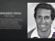 Memorial banner for Armando Vega (1935–2026) with his photo on the right and achievements text on the left; LSU Athletics logo bottom-right.