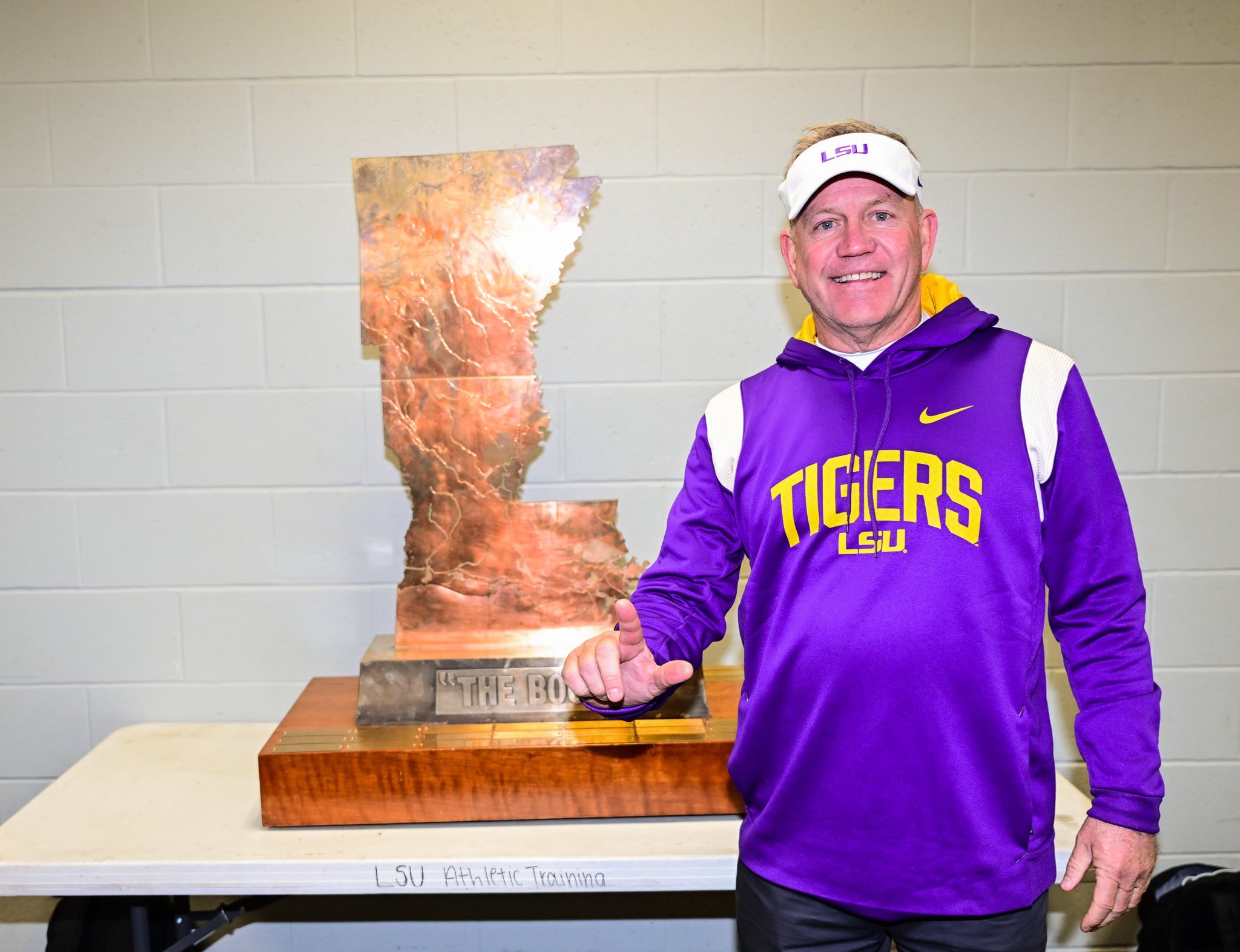 Brian Kelly with Golden Boot Trophy