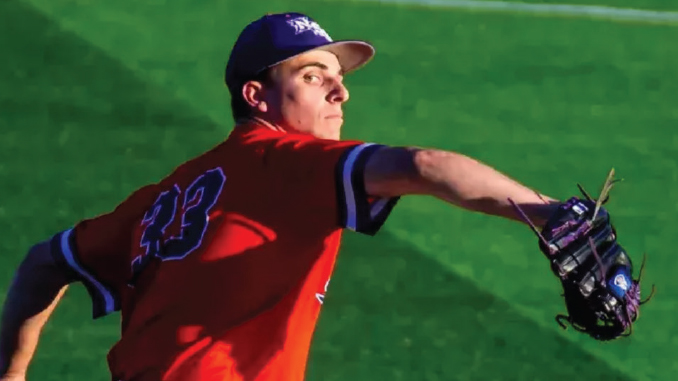 Baseball pitcher in a red jersey and blue cap mid-throw on a green field, glove extended outward.