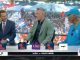 ESPN broadcast desk with three men chatting during a college football game; LSU and Ole Miss logos visible, Coors Light ad, crowded outdoor set in the background