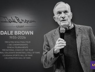 Portrait of Dale Brown speaking into a microphone on a memorial banner listing his life (1935–2026) and honors, with an LSU logo.