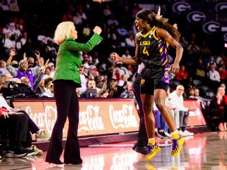 Flau'jae Johnson, LSU guard and Kim Mulkey, LSU head coach