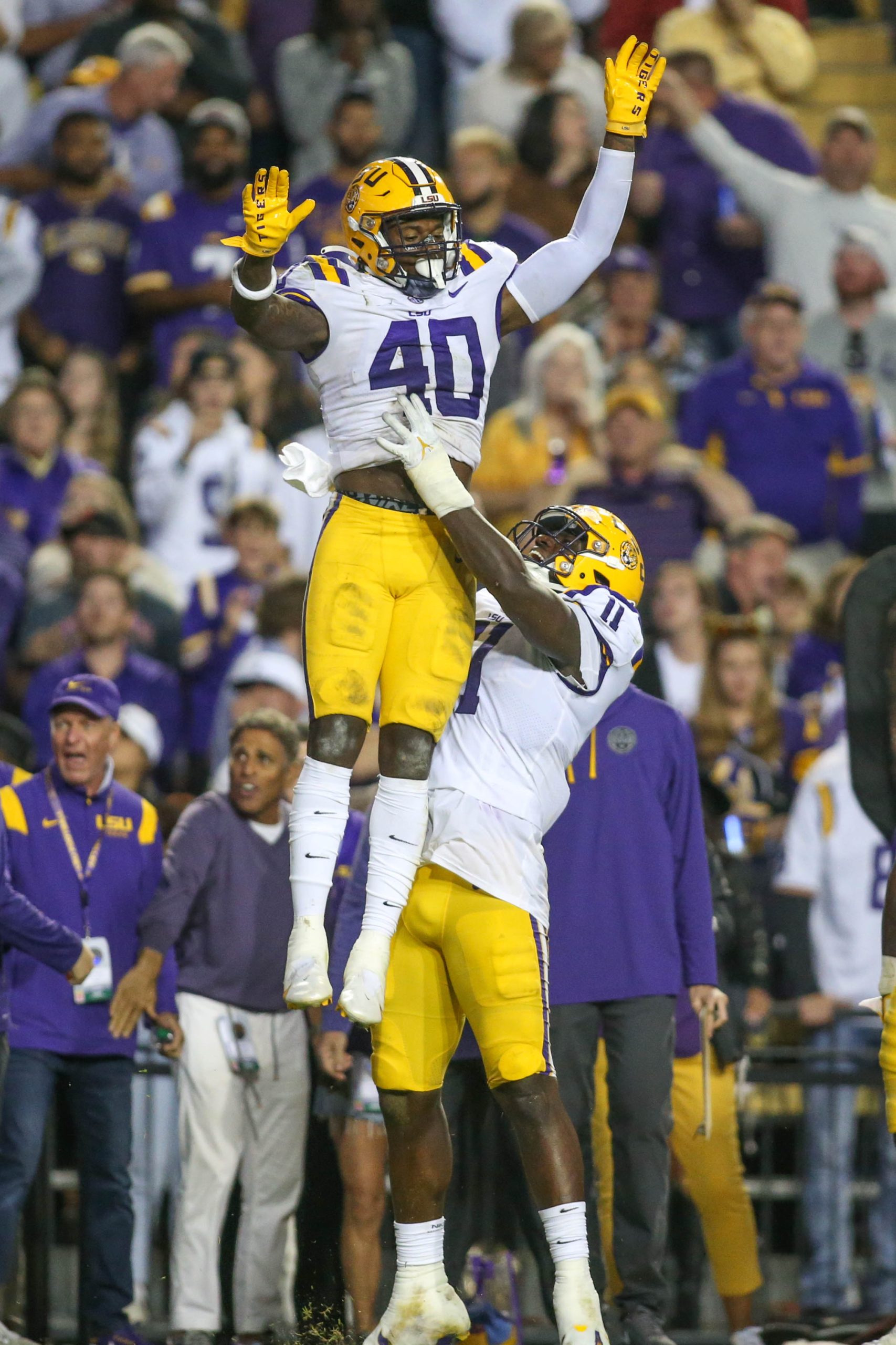 Harold Perkins gets a lift from Ali Gaye (11)