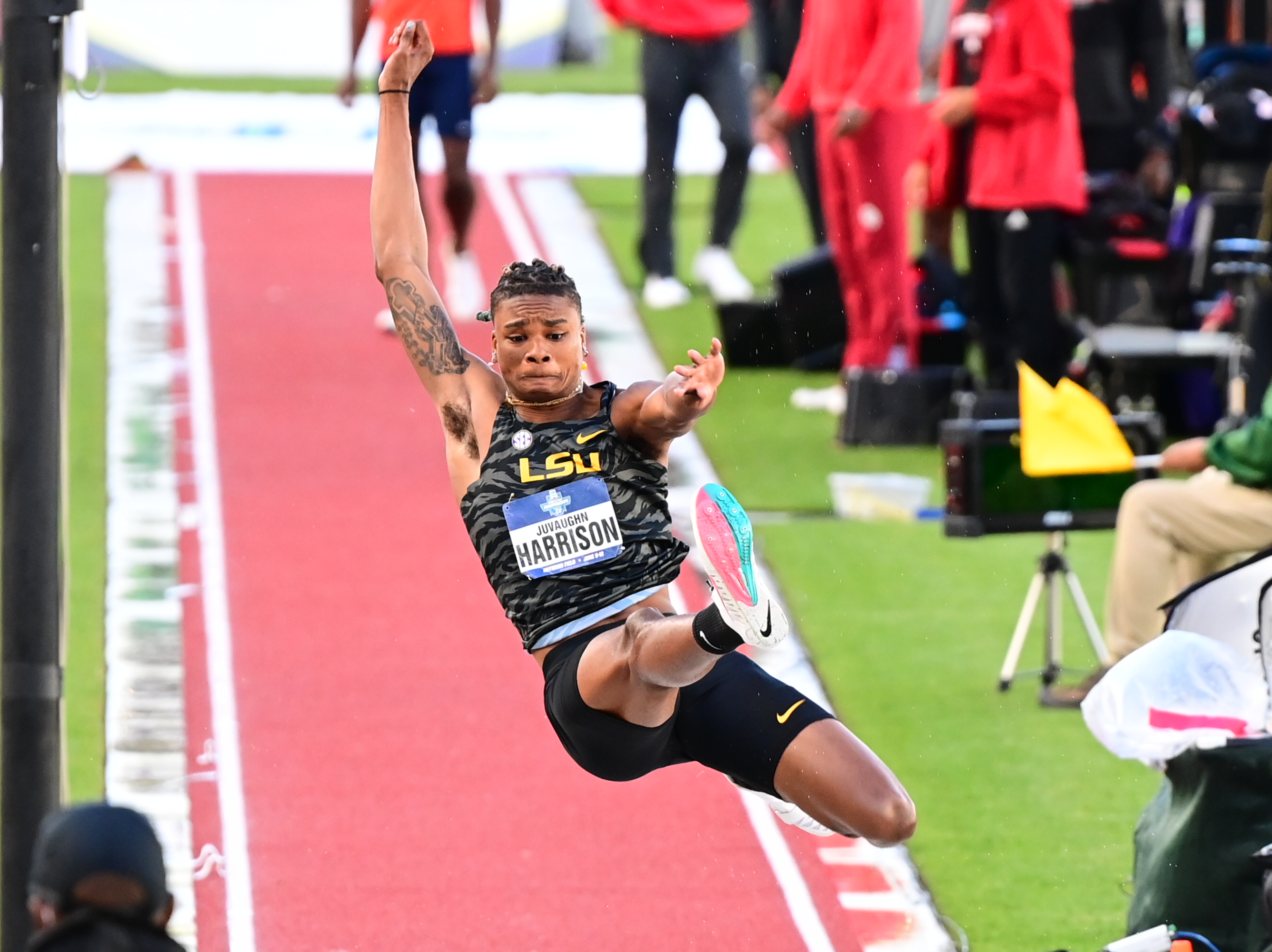 Harrison wins long jump
