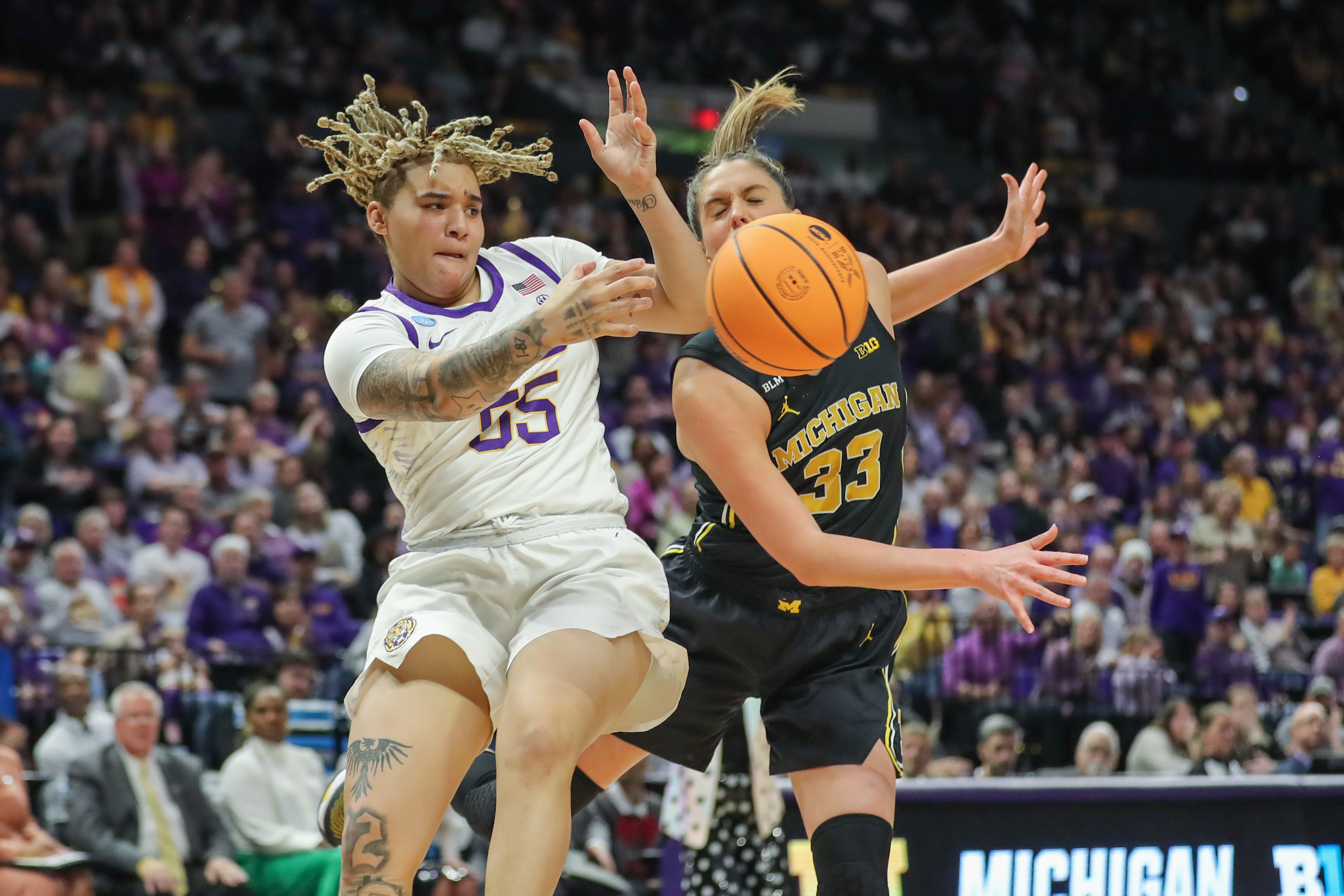 Kateri Poole 55 makes pass vs Michigan