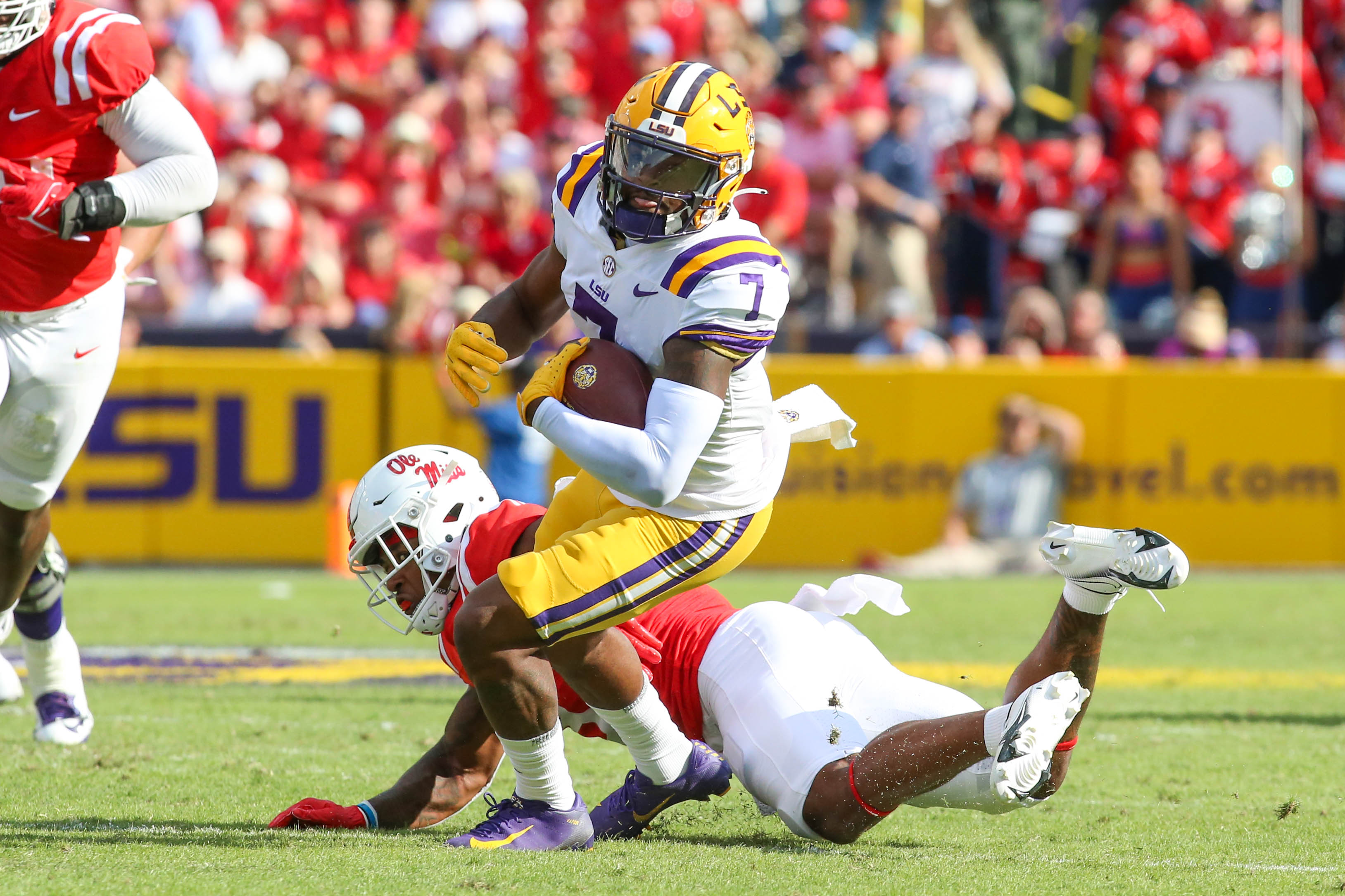 Kayshon Boutte (7) turns upfield after making a catch
