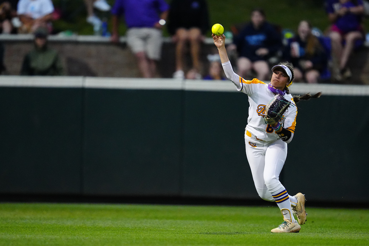 LSU outfielder Ciara Briggs gets the ball back into the field of play Saturday against Arkansas. Photo courtesy of LSU athletics.