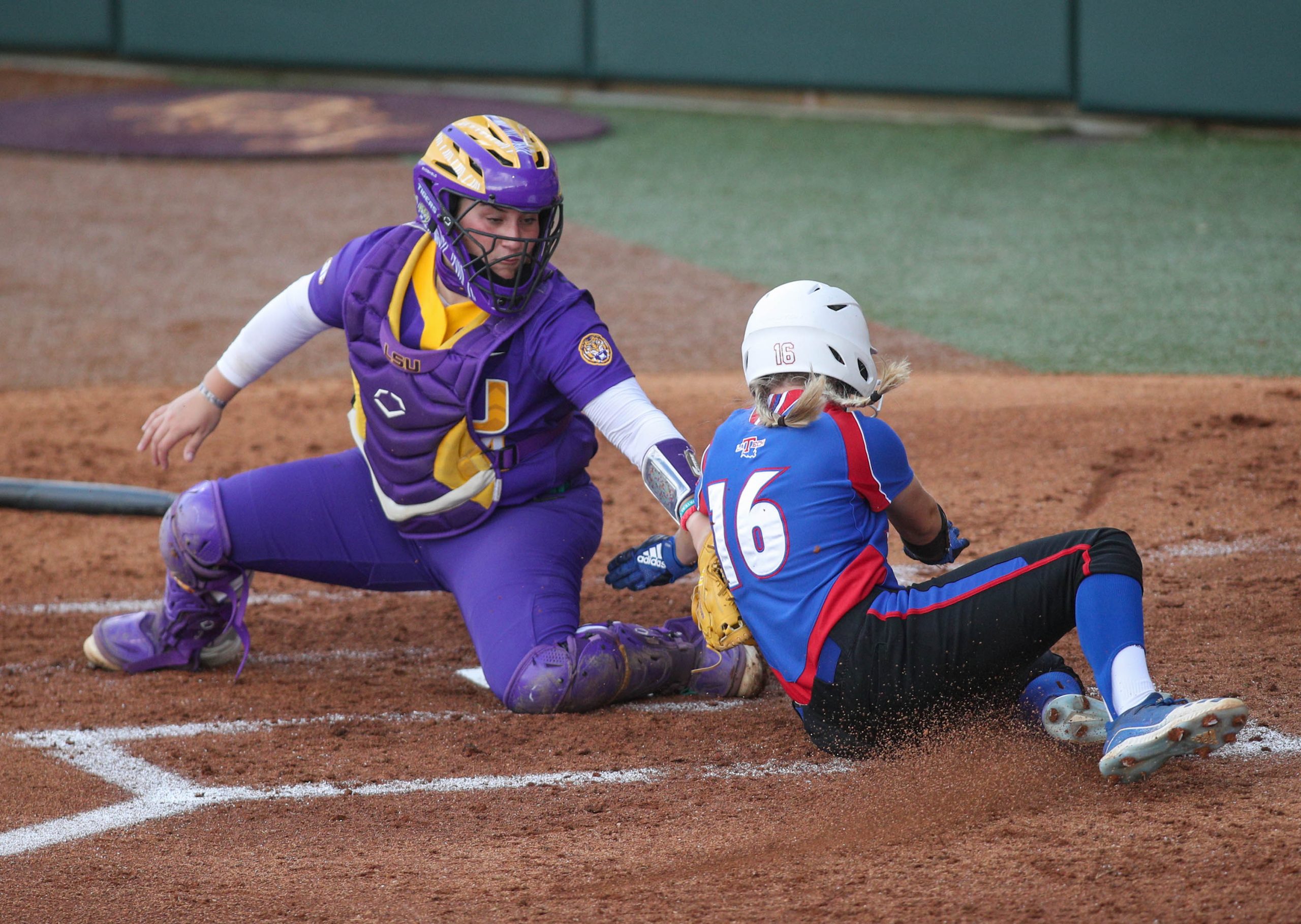 LSU softball play at plate