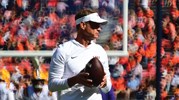 Lane Kiffin, LSU head coach, warming up at Auburn 2026