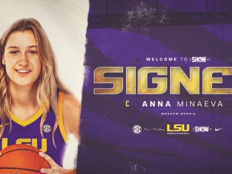 Portrait of a smiling female basketball player in an LSU purple-and-gold jersey holding a basketball, on a signing poster that reads 'SIGNED' with the name Anna Minaeva.