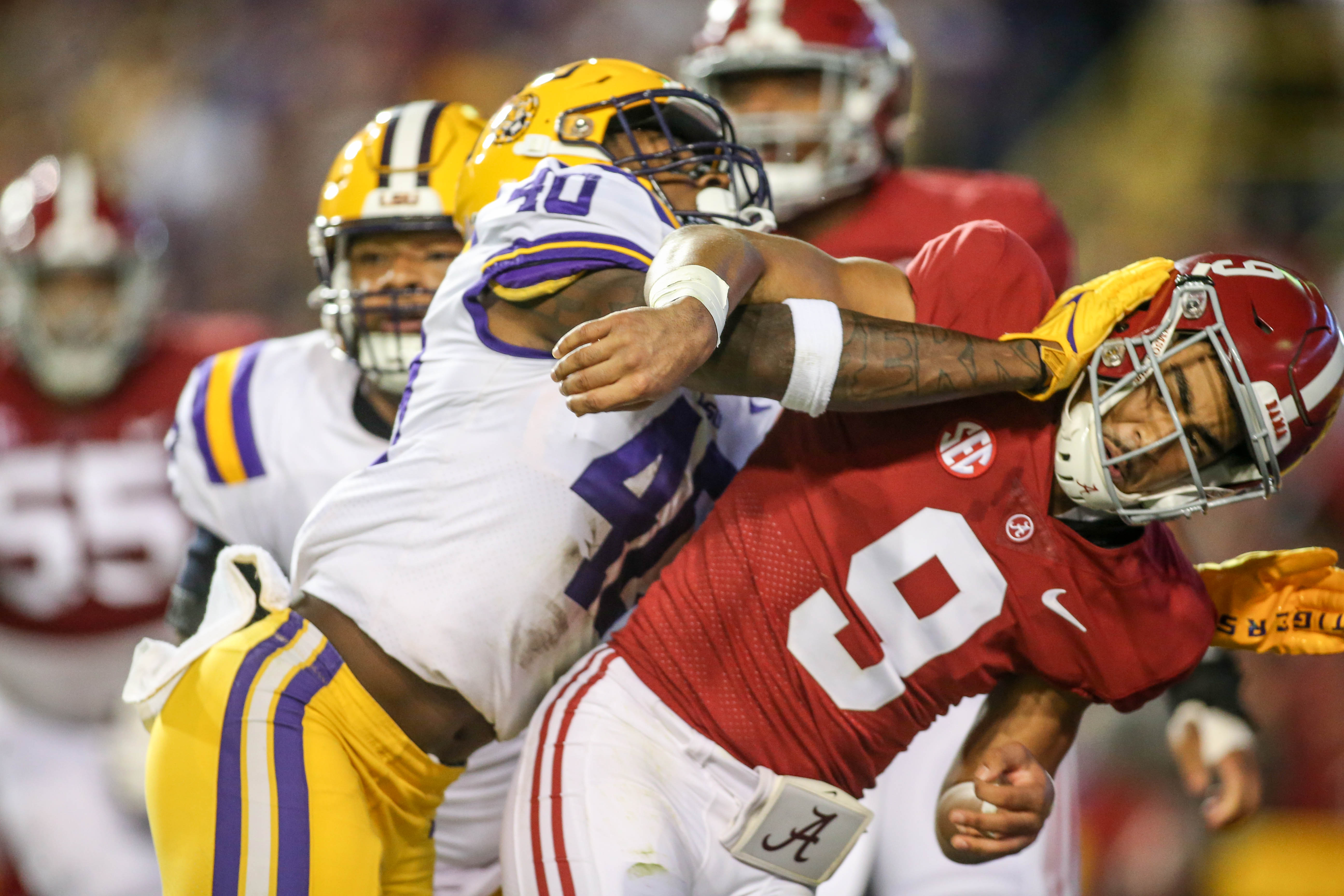 LSU's Harold Perkins (40) pressures Alabama's Bryce Young