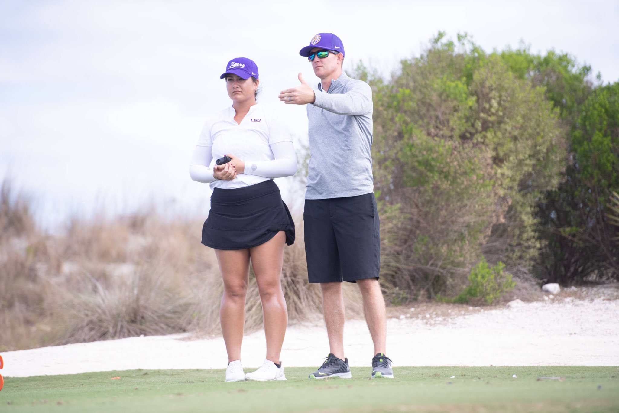 Latanna Stone and coach Garrett Runion
