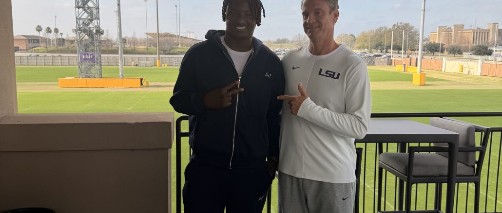 Malachi Thomas, new LSU transfer tight end and head coach Lane Kiffin
