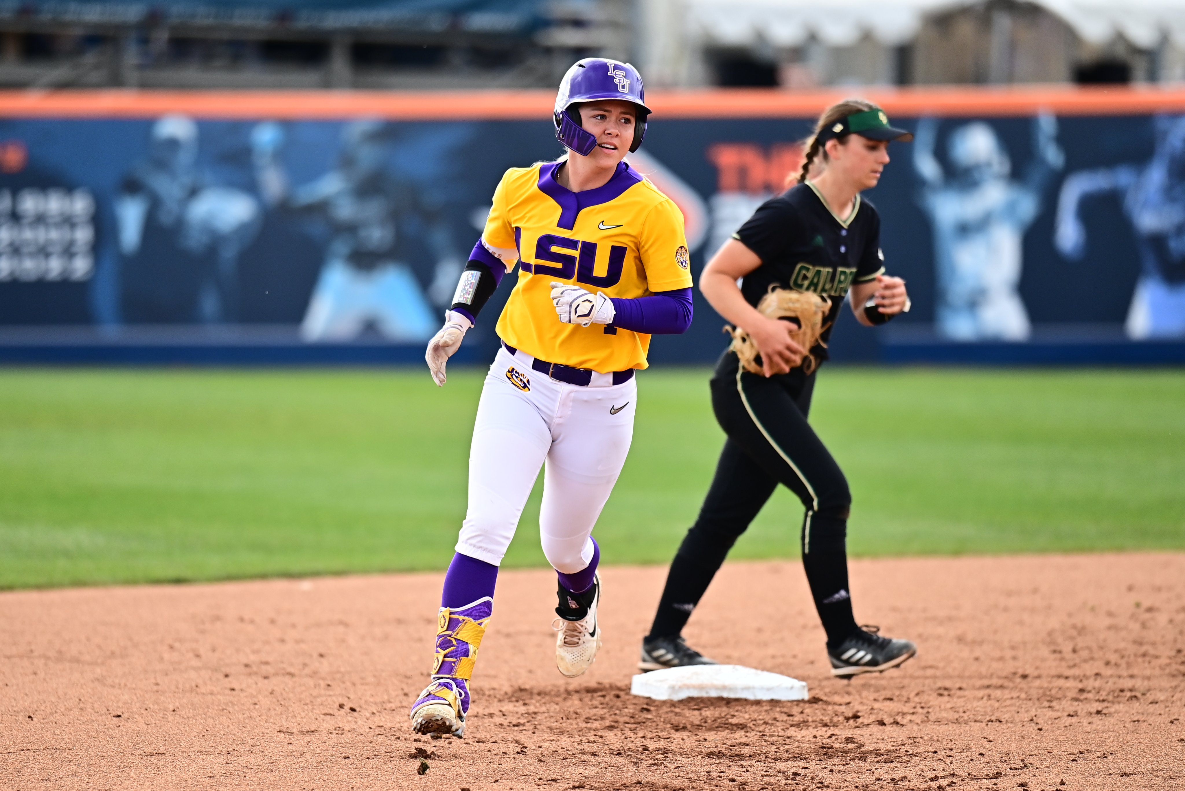 McKenzie Redoutey rounds second after HR vs Cal Poly