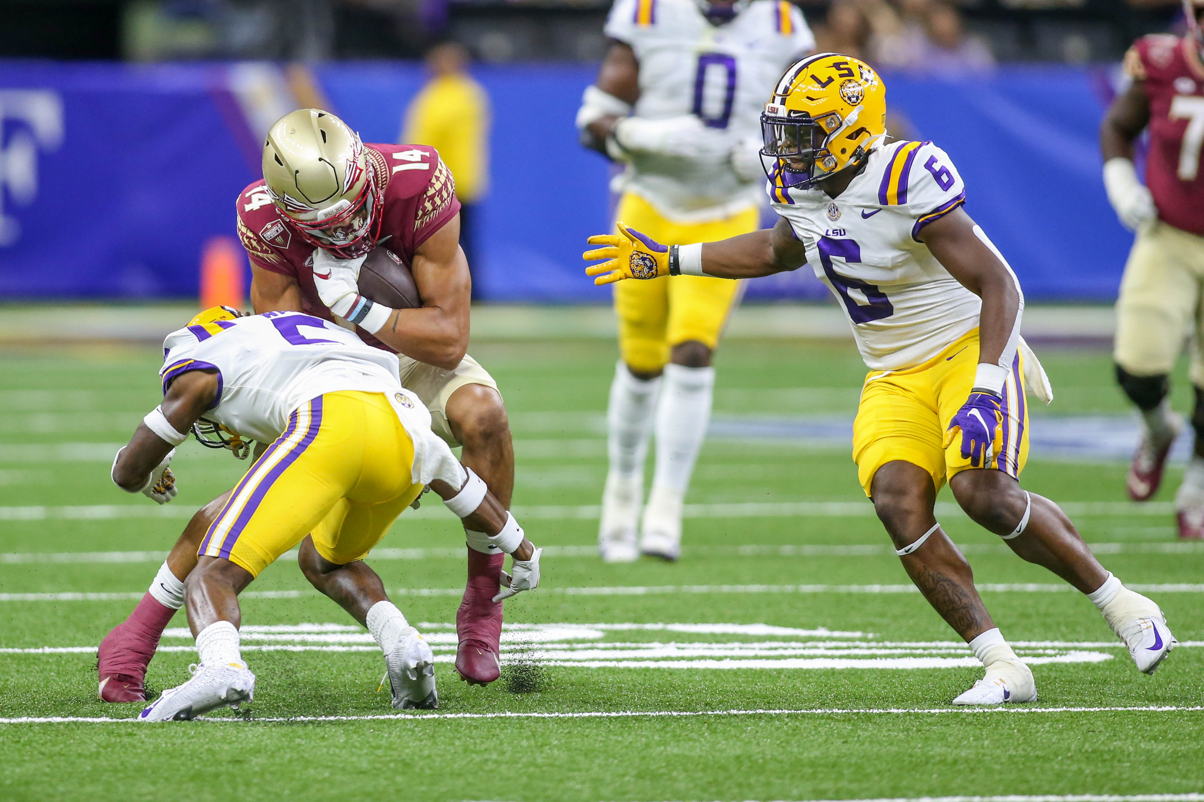 Mehki Garner makes tackle on FSU's Johnny Wilson