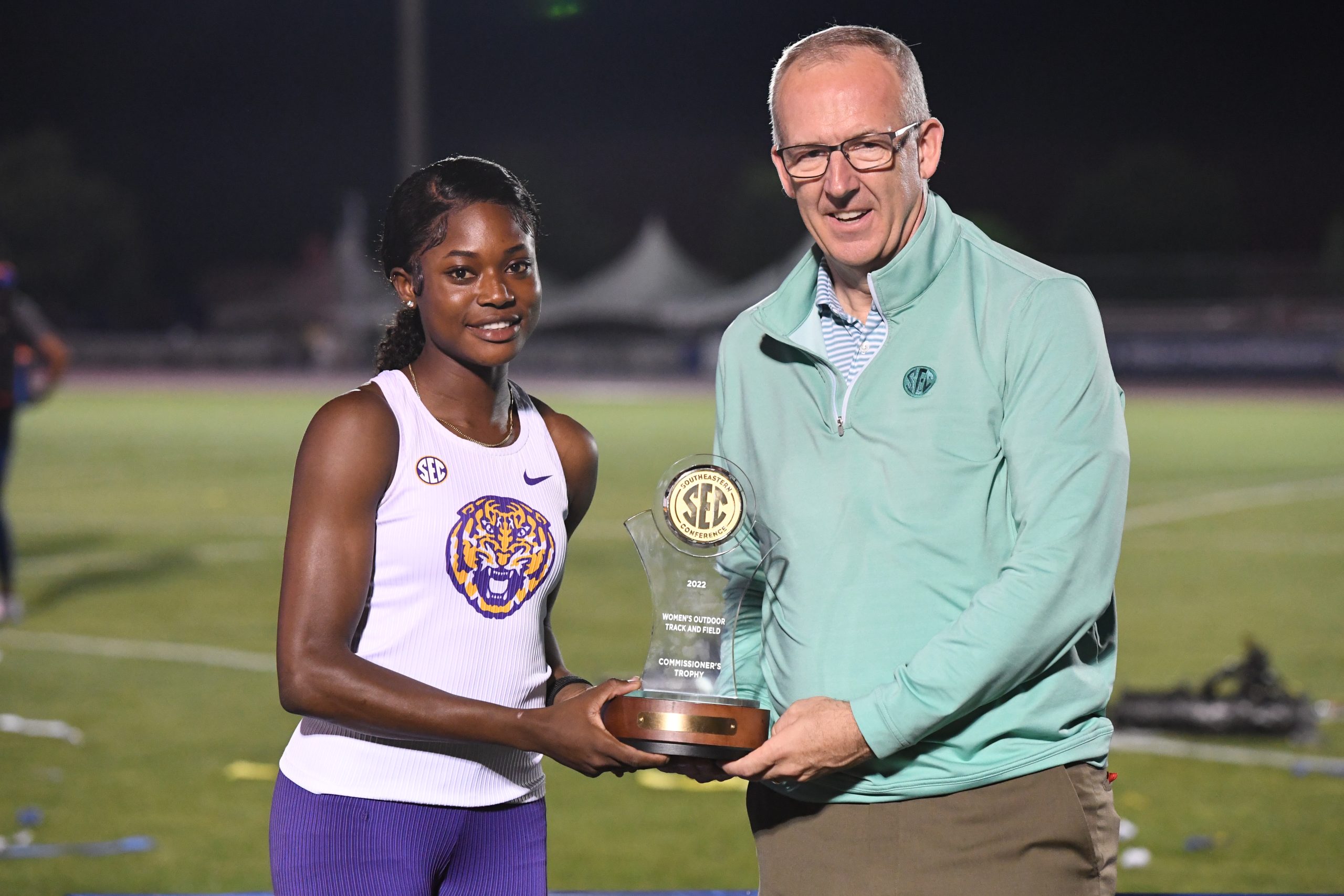 Ofili with award