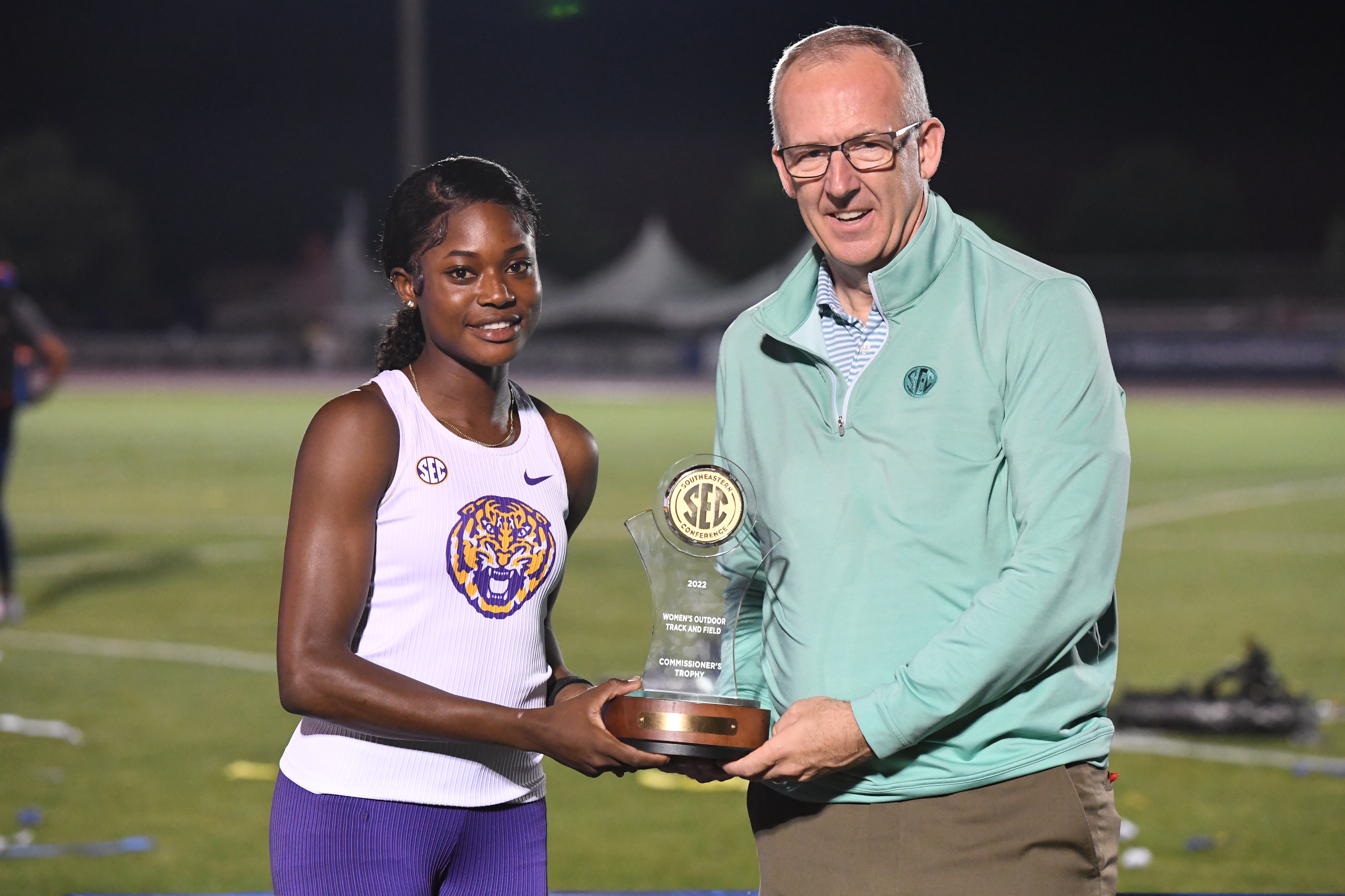 Ofili with award